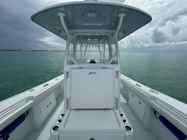 Slide: The Image of 2025 Yellowfin 32 boat on calm sea under cloudy sky. - 31