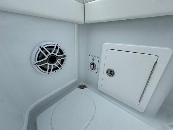 Slide: The Image of 2025 Yellowfin 32 boat interior with speaker and storage compartment. - 37