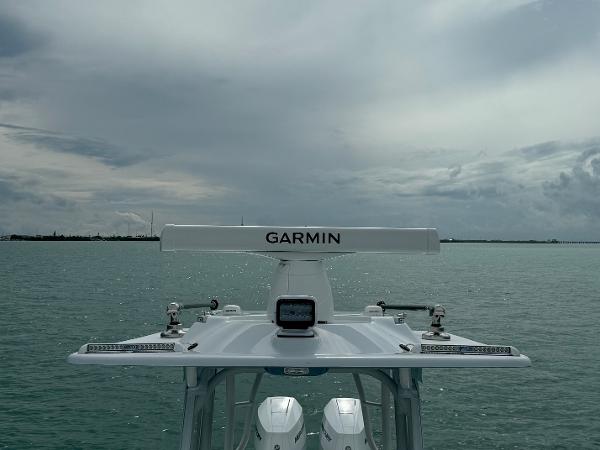 Slide: The Image of 2025 Yellowfin 32 boat with Garmin radar on open water. - 38