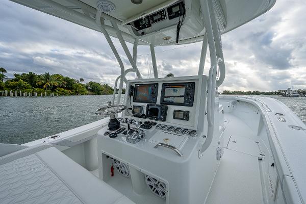 Slide: The Image of 2009 Yellowfin 36 boat cockpit with advanced navigation systems. - 14