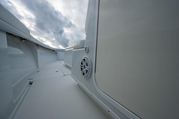 Slide: The Image of 2009 Yellowfin 36 boat deck with speaker and storage compartments. - 18