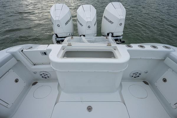 Slide: The Image of 2009 Yellowfin 36 boat with triple Mercury outboard engines. - 22