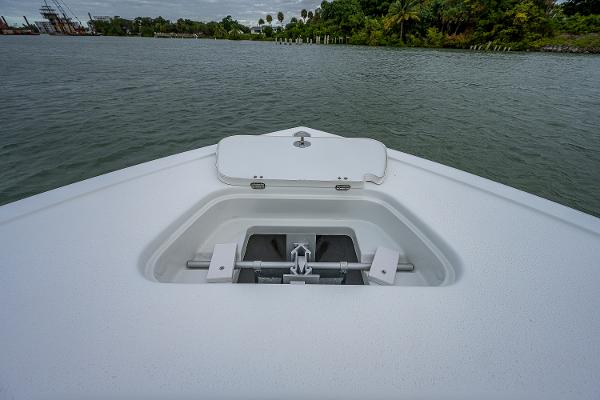 Slide: The Image of Bow view of a 2009 Yellowfin 36 boat on the water. - 4