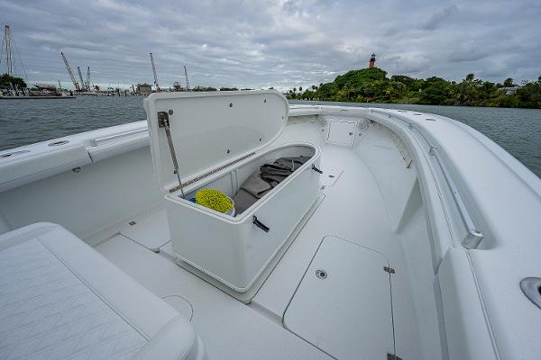 Slide: The Image of 2009 Yellowfin 36 boat with open storage compartment on deck. - 8