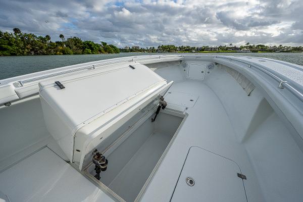 Slide: The Image of 2009 Yellowfin 36 boat with open storage compartment on deck. - 9