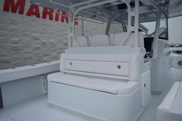 Slide: The Image of 2024 Yellowfin 42 boat interior with white seating and console. - 12