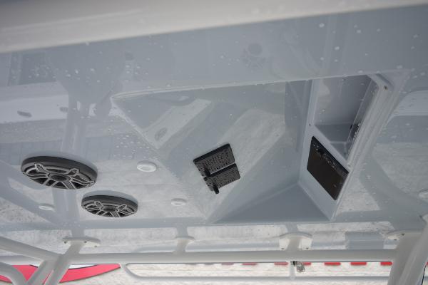 Slide: The Image of 2024 Yellowfin 42 boat ceiling with speakers and electronic panel. - 18