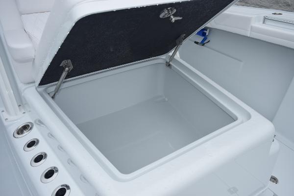 Slide: The Image of Open storage compartment on a 2024 Yellowfin 42 boat. - 24