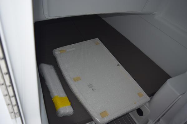 Slide: The Image of Interior storage compartment of 2024 Yellowfin 42 boat with packaged items. - 27