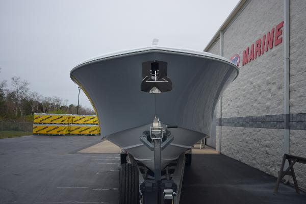 Slide: The Image of 2024 Yellowfin 42 boat on trailer outside marine dealership. - 3