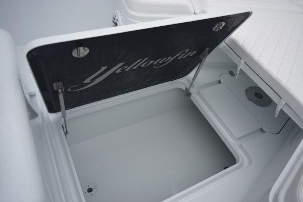 Slide: The Image of Open storage compartment on 2024 Yellowfin 42 boat. - 31