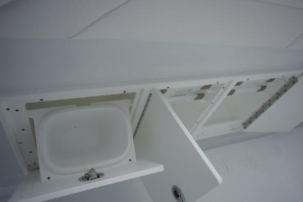 Slide: The Image of Storage compartments on a 2024 Yellowfin 42 boat. - 33