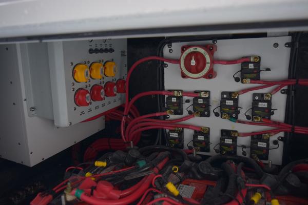 Slide: The Image of Electrical system of a 2024 Yellowfin 42 boat with wiring and control panels. - 34