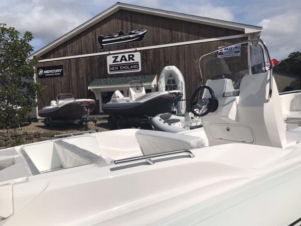 Slide: The Image of 2024 Zar Formenti 59 SL boat at Zar New England dealership. - 1