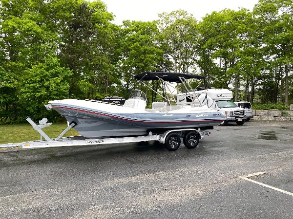 Slide: The Image of 2023 Zar Formenti Zar 65 boat on a trailer in a parking lot. - 4