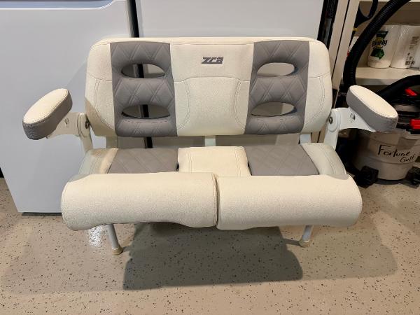Slide: The Image of ZCB Freemason 26 boat seat, 2023 model, featuring gray and white cushioned design with armrests. - 4